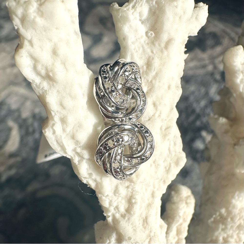 Macy's
Diamond Love Knot Stud Earrings (1/10 ct. t.w.) in Sterling Silver - Picture 3 of 3